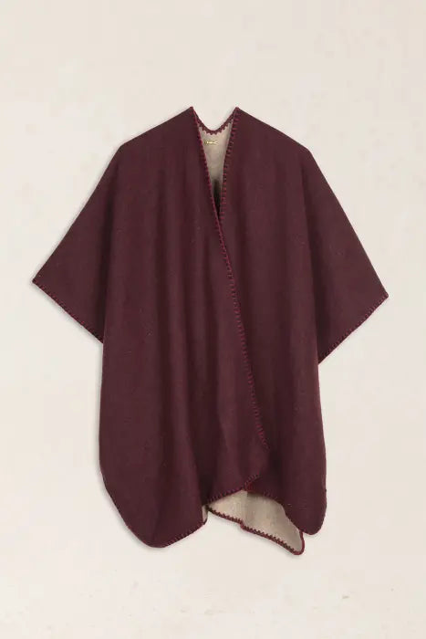 Poncho Reversible Latido