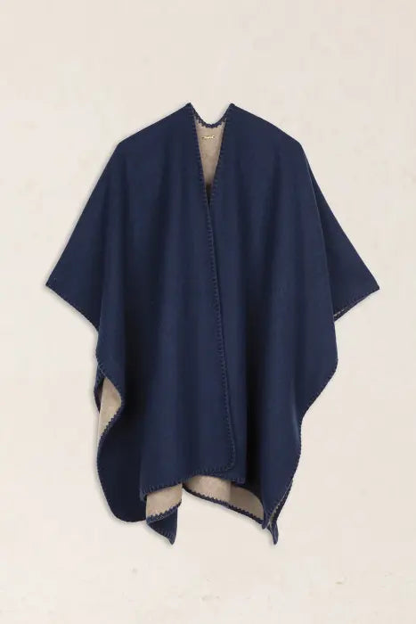 Poncho Reversible Latido