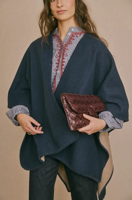 Poncho Reversible Latido